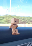 Pequena figura de madera encantadora que balança com 12 expressões magnéticas